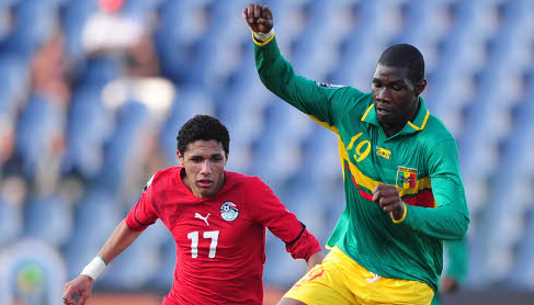 Ibrahim Diallo of Mali challenged by Mohammed El Neny of Egypt