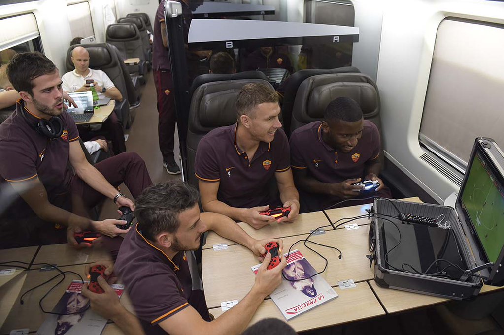 AS Roma Players relaxing in the bus